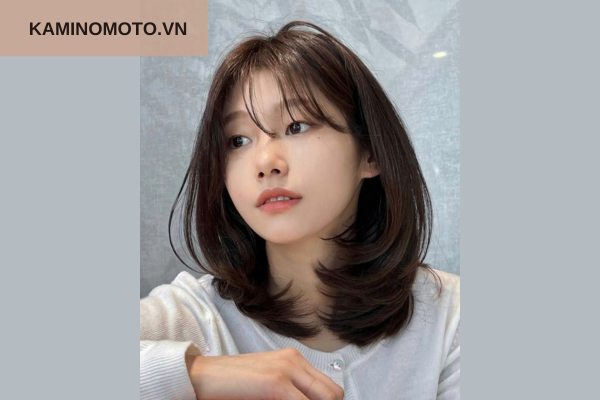 Tóc ngang cổ duỗi phồng