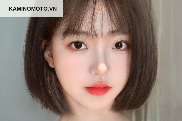 Tóc ngang cổ uốn cụp đuôi